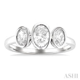 1.00 Ctw 3-Stone Bezel Set Oval Cut Diamond Ring in 14K White Gold